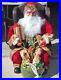 31_Santa_Claus_Sitting_in_Wing_Chair_Holiday_Christmas_Display_presents_toys_01_ibpa