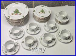 44 pieces Christmas China by Holiday Hostess 12 Dinner 12 Salad 12 Saucers 8 Cup