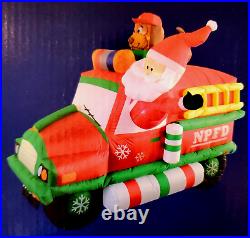 Celebrations Inflatable Airblown 7.5' Christmas Santa Claus in Fire Truck Engine