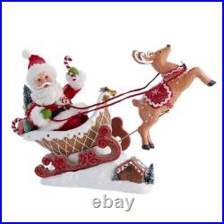 Fabriche Santa Sitting in Gingerbread Sleigh Christmas Figurine 9.75 Inch FA0148
