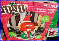 GEMMY Red M&M Character Sitting on a Christmas Present. 6FT Airblown Inflatable