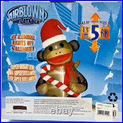 Gemmy 5' AirBlown Sock Monkey With Scarf Santa Hat Holding Candy Cane Inflatable