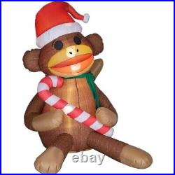 Gemmy 5' AirBlown Sock Monkey With Scarf Santa Hat Holding Candy Cane Inflatable