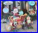 Gemmy_6_Christmas_Lighted_Animated_Santa_Elves_Fix_Sleigh_Airblown_Inflatable_01_dqyj