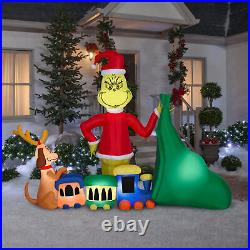 Gemmy Christmas Airblown Inflatable Grinch Putting Train in Santa Sack 9 ft long