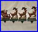 Midwest_of_Cannon_Falls_SANTA_S_SLEIGH_REINDEER_Stocking_Hanger_Set_Cast_Iron_01_zq