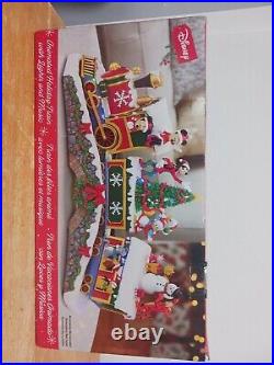 NIB Disney Animated Holiday Christmas Train with Lights & Classic Holiday Music