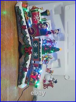 NIB Disney Animated Holiday Christmas Train with Lights & Classic Holiday Music
