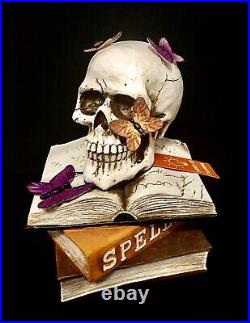 NWT Skull Resting On Spell Books LED Lights Up 10 Halloween Decor