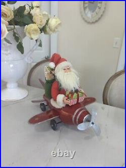 Xmas Santa On A AirPlane Red Indoor Festive Decoration Wheels Bottle Brush Tree