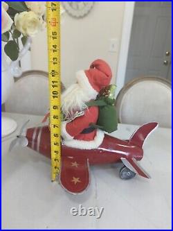 Xmas Santa On A AirPlane Red Indoor Festive Decoration Wheels Bottle Brush Tree